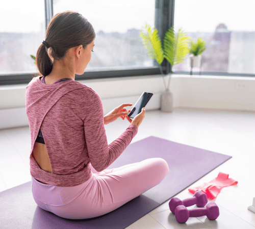 Woman starting a rehab program from her phone